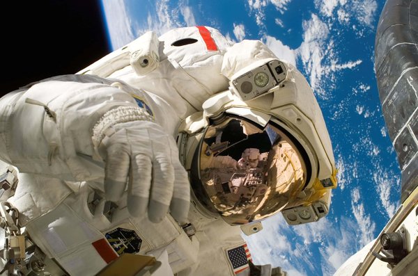 What Are the Health Impacts of Space Travel on Astronauts, and How Are They Managed?